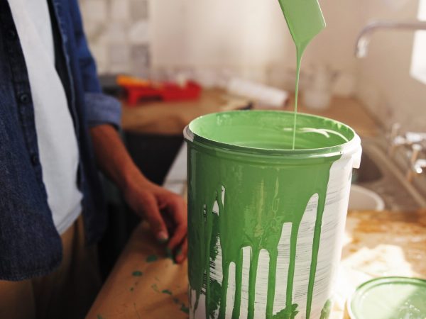 Diy,,Paint,Can,And,Renovation,With,Person,In,Kitchen,Of